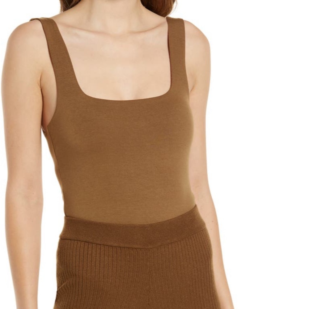 Good American size 2 modern tank body suit, great condition.